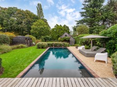 Geonet BVBA Moderne zwemvijver met authentieke look